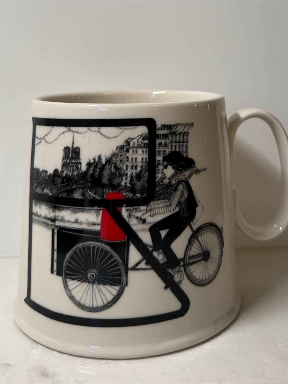 Anthropologie Cream Mug with Black City Illustration and Red Accent “B” Design